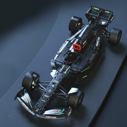 Scale racing car made from building blocks with text on a dark background