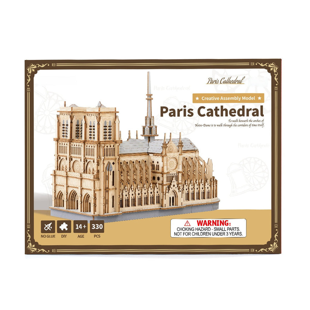 Model of Paris Cathedral packaging with architectural design on a white background