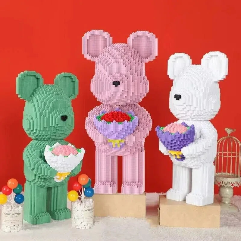 Three bear-shaped figures made of interlocking bricks against a red background