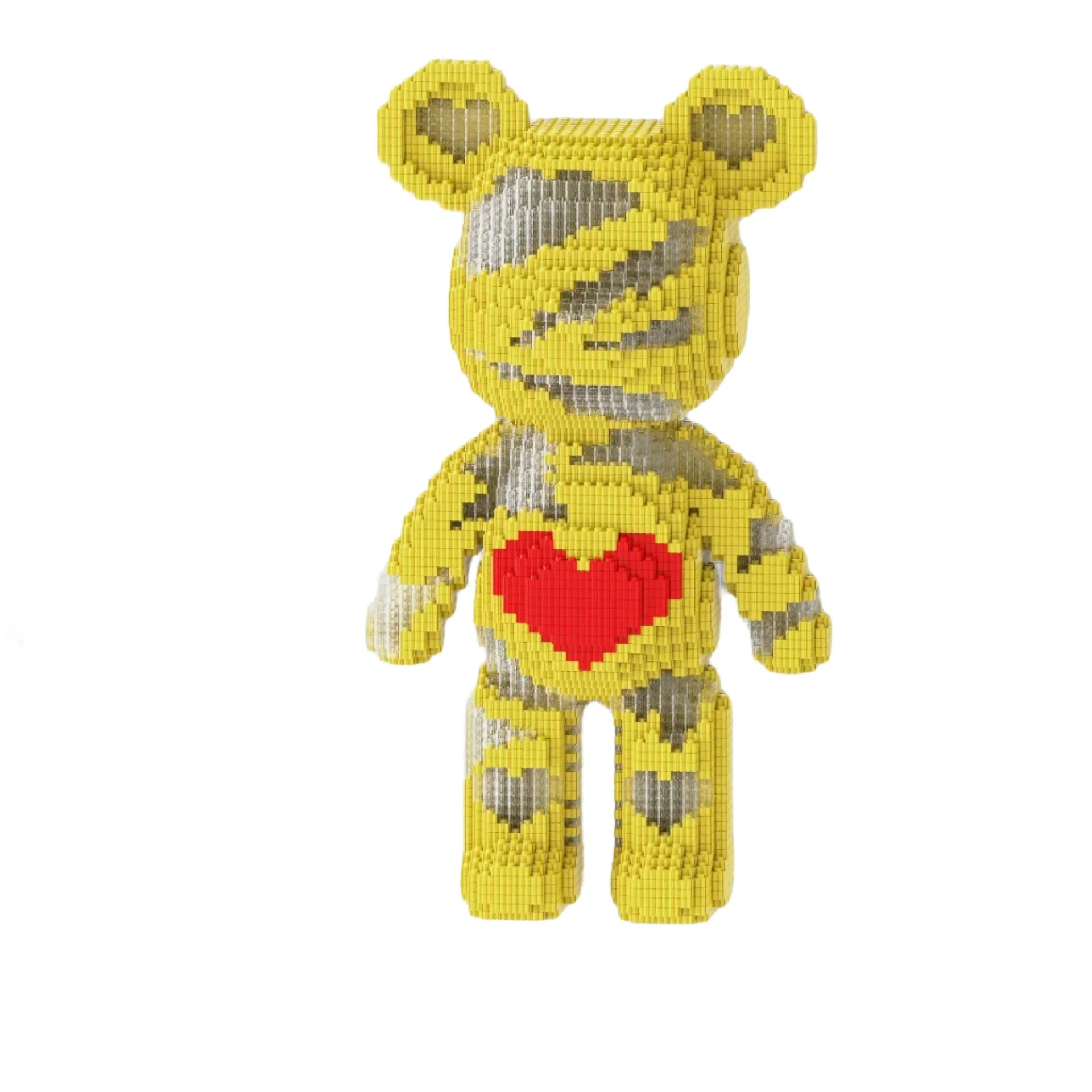 Yellow bear-shaped building block set with a red heart on a white platform, surrounded by blue gift boxes.