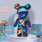 Colorful pixelated bear toy with measurements and gift boxes in the background