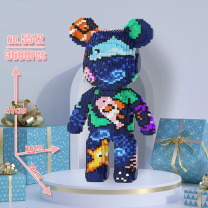 Colorful pixelated bear toy with measurements and gift boxes in the background