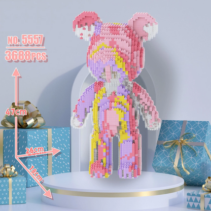 Colorful 3D puzzle bear model with measurements and gift boxes in the background