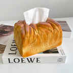 Realistic bread-shaped tissue box holder with premium PU construction and innovative dispensing mechanism