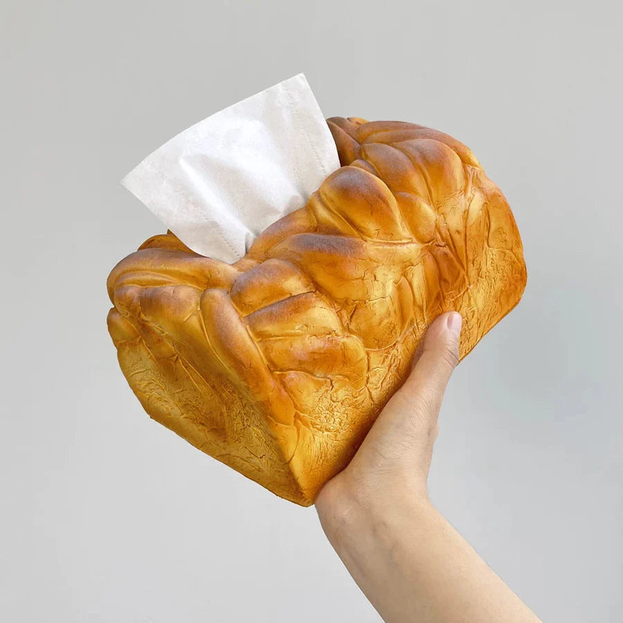 Realistic bread-shaped tissue box holder with premium PU construction and innovative dispensing mechanism